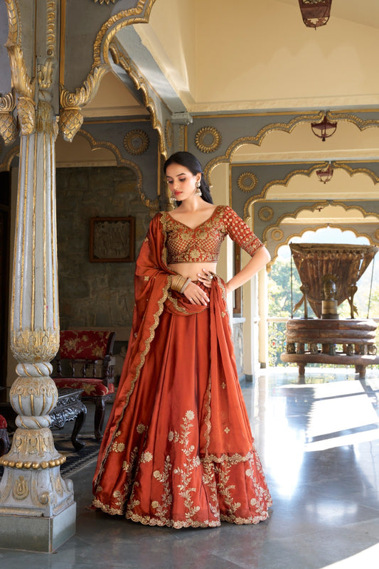 Wedding Wear Heavy Rangoli Silk Orange Color Lehenga Choli