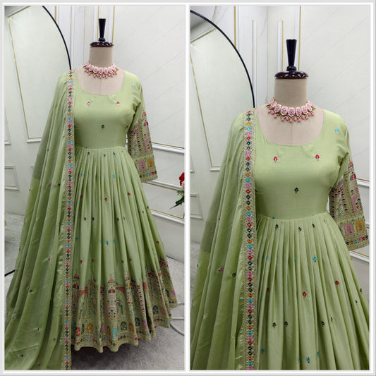 Stunning Embroidery Work Pista Color Anarkali Gown