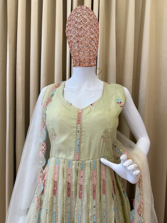 Ravishing Pista Simmer Embroidery Work Gown
