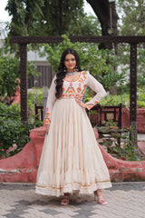 Ravishing White Cotton Embroidered Gown For Navratri Ravishing White Cotton Embroidered Gown For Navratri