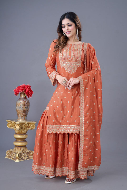 Delightful Chinon Silk Orange Color Sharara Suit
