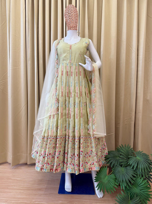 Ravishing Pista Simmer Embroidery Work Gown