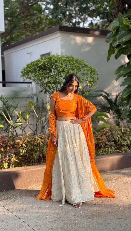 Occasion Wear Orange Choli With White Lehenga