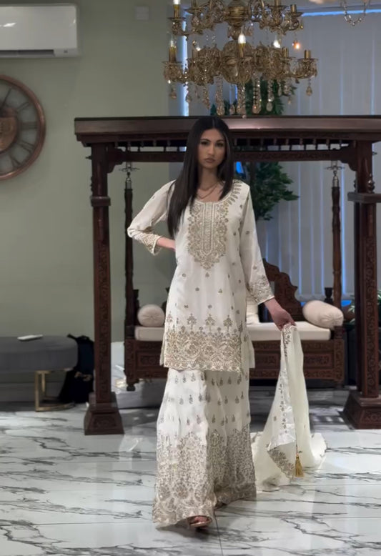Fabulous Georgette White Color Sharara Suit
