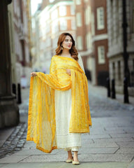 Glorious White Color Salwar Suit Yellow Dupatta Glorious White Color Salwar Suit Yellow Dupatta
