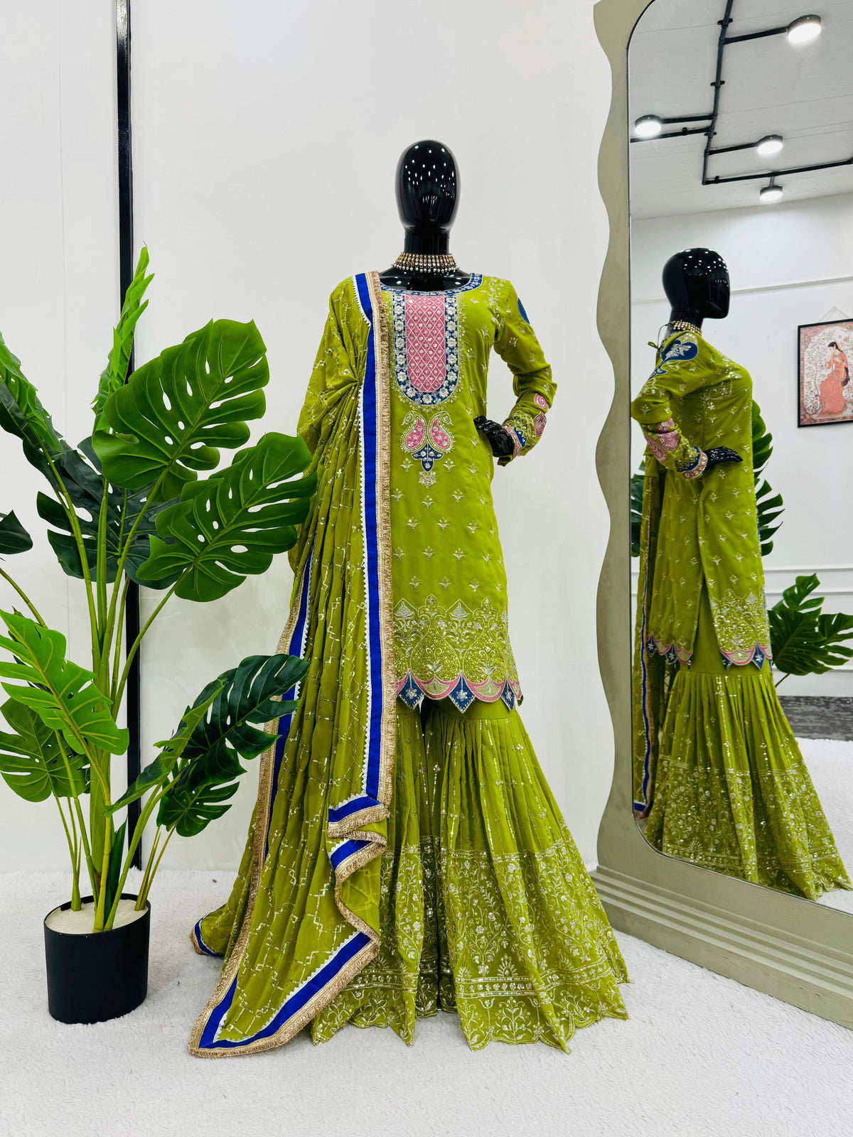 Delightful Heavy Green Color Sharara suit
