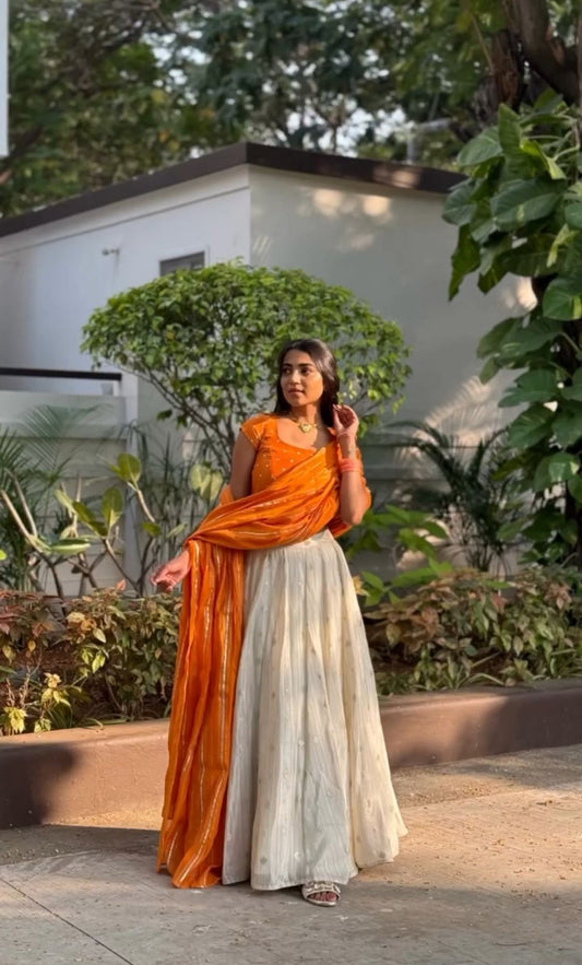 Occasion Wear Orange Choli With White Lehenga