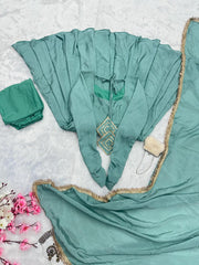 Fabulous Chinnon Silk Aqua Green Color Anarkali Gown Fabulous Chinnon Silk Aqua Green Color Anarkali Gown