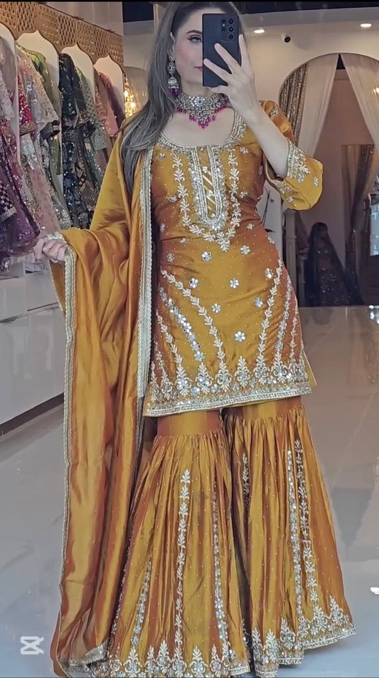 Demanding Embroidery Work Mustard Color Sharara Suit