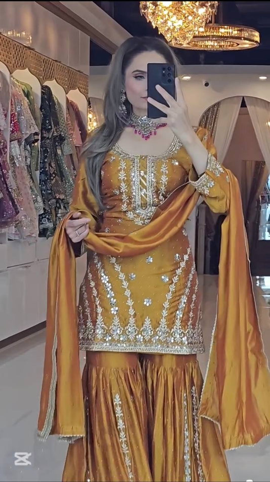 Demanding Embroidery Work Mustard Color Sharara Suit