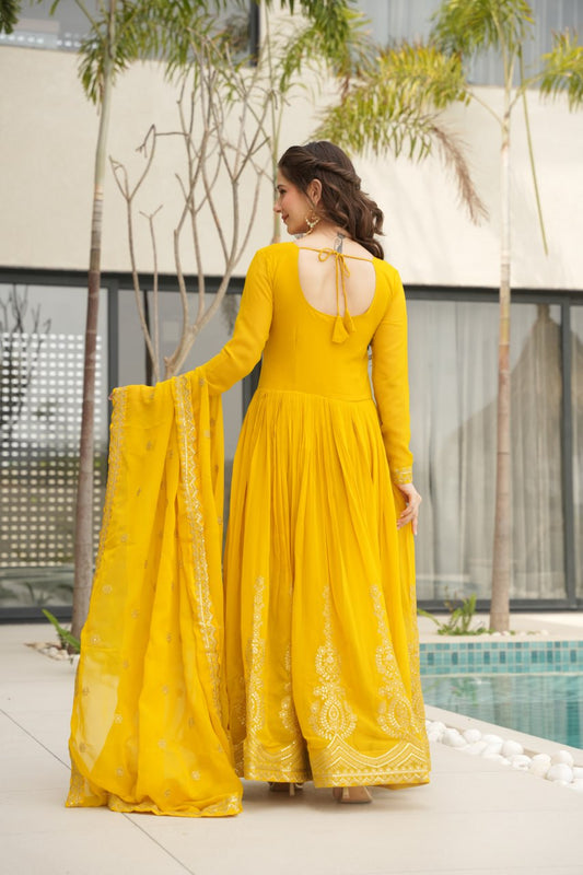 Traditional Wear Embroidered Work Yellow Color Gown