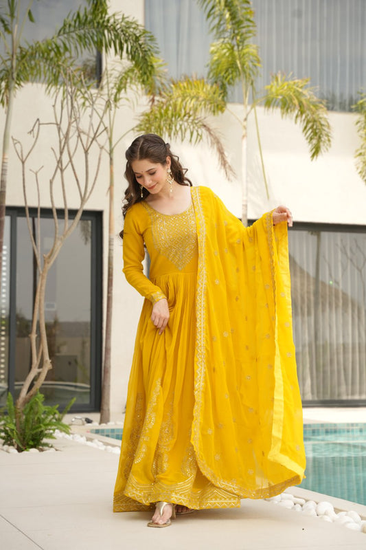 Traditional Wear Embroidered Work Yellow Color Gown