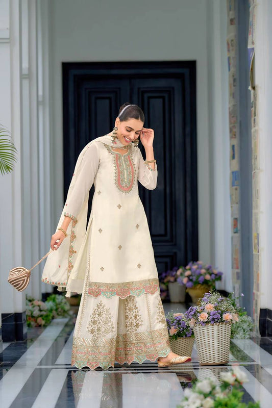 Demanding Embroidery Work White Color Sharara Suit