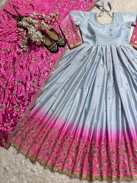 Admiring Embroidery Work Double Shaded Gown