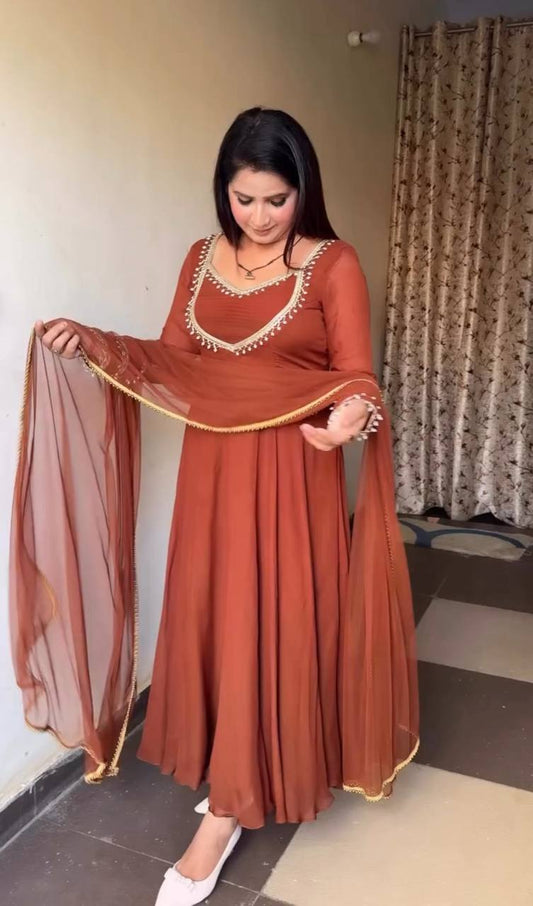 Alluring Brown Georgette with Moti Work Gown