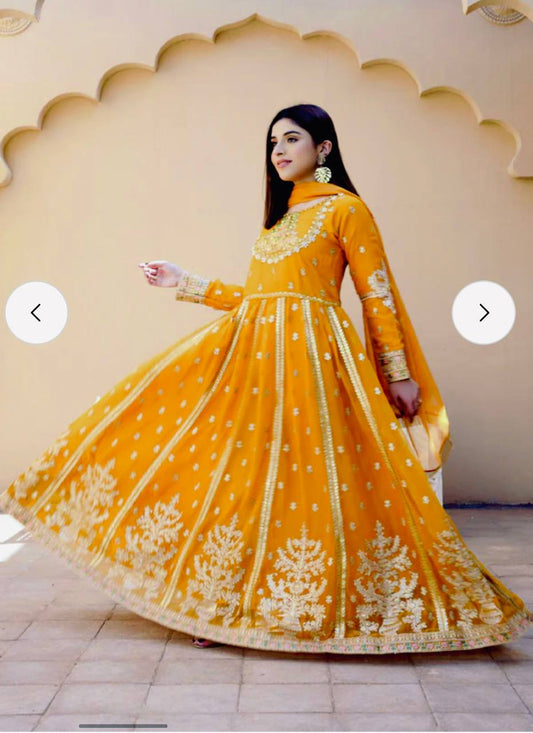 Lovely Yellow Georgette Sequence Work Designer Gown