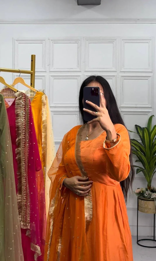 Preferable Orange Color Plain Gown With Work Net Dupatta