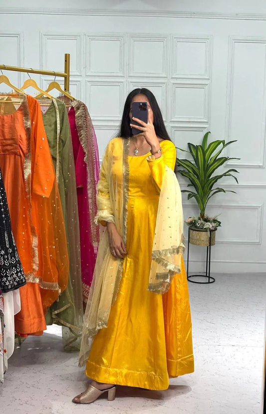 Wonderful Yellow Color Plain Gown With Work Net Dupatta