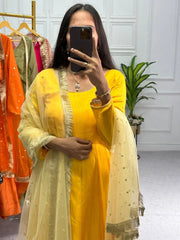 Wonderful Yellow Color Plain Gown With Work Net Dupatta