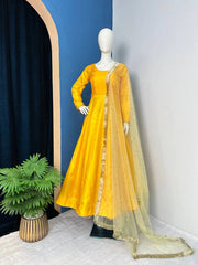 Wonderful Yellow Color Plain Gown With Work Net Dupatta