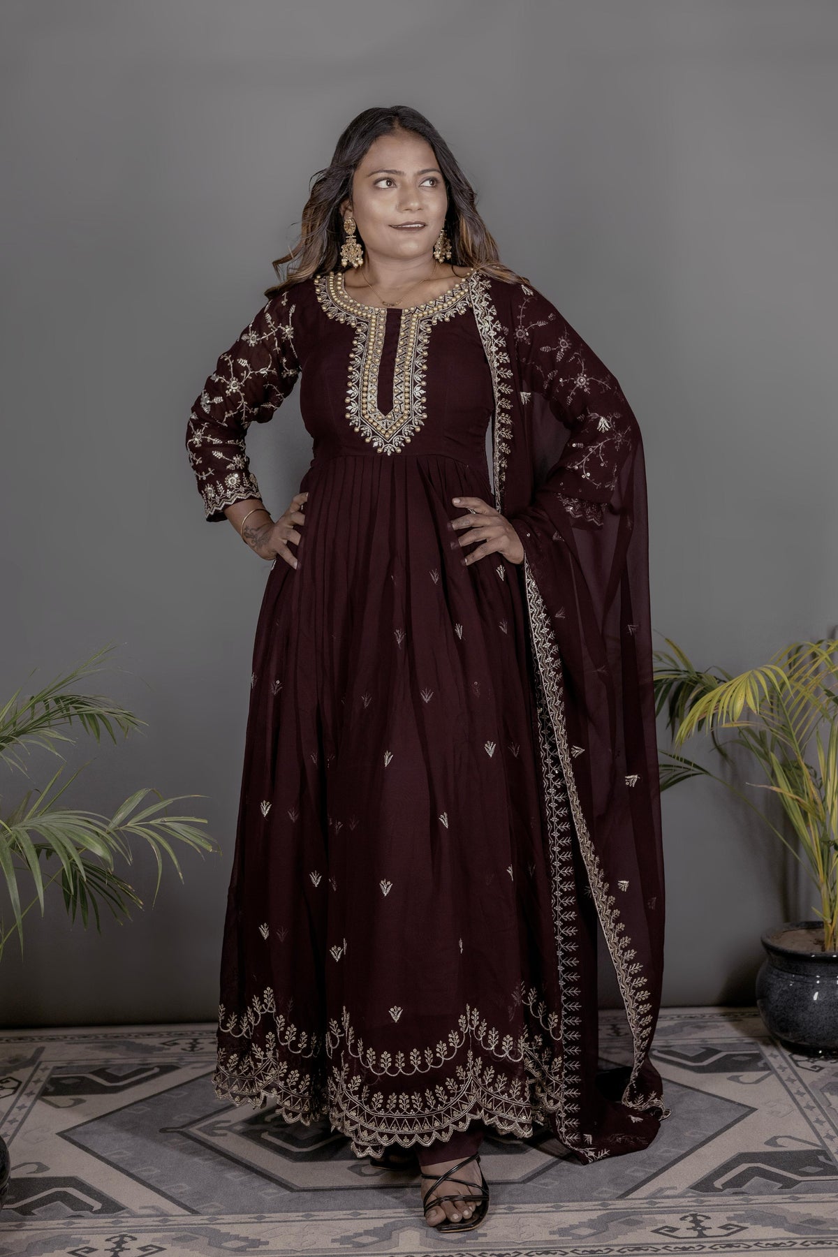 Unique Riveted Moti Work Wine Color Gown