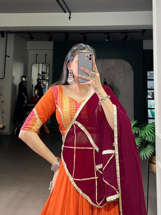 Lovely Orange Rayon Bandhej Print Lehenga Choli