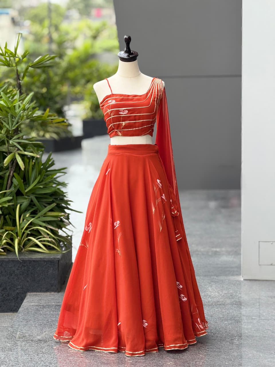 Opulent Red Color Georgette Hand Painted Lehenga