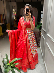 Outstanding Patola Print With Foil Work Red Color Lehenga Choli