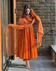 Fabulous Chinnon Silk Orange Color Anarkali Gown