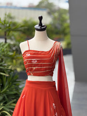 Opulent Red Color Georgette Hand Painted Lehenga