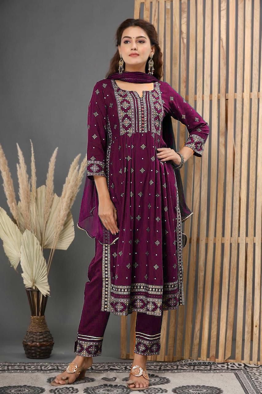 Delightful Foil Print Wine Color Salwar Suit