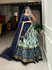 Mesmerizing Floral And Patola Print With Foil Work Blue Color Lehenga Choli