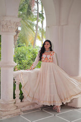 Ravishing White Cotton Embroidered Gown For Navratri