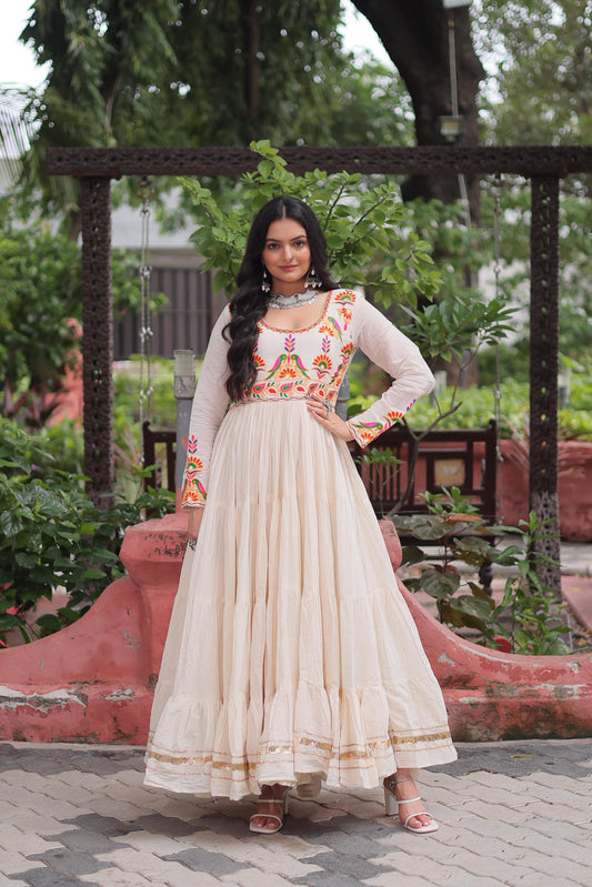 Ravishing White Cotton Embroidered Gown For Navratri