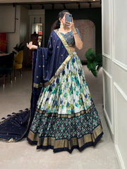 Mesmerizing Floral And Patola Print With Foil Work Blue Color Lehenga Choli