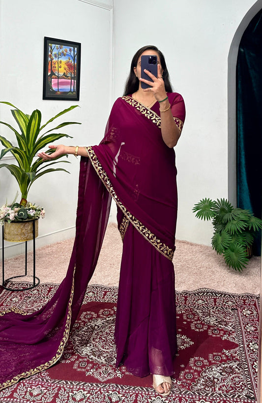 Captivating Embroidery Work Wine Color Saree Gown