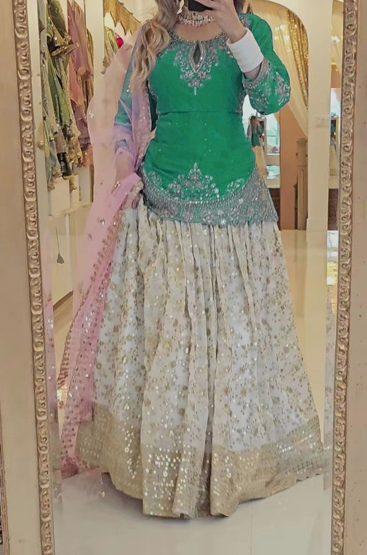 Outstanding Embroidery Work Green Color Top With Lehenga