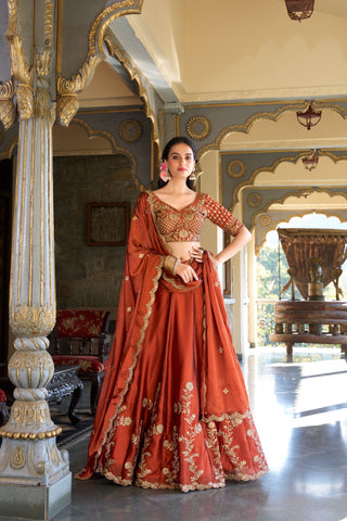 Wedding Wear Heavy Rangoli Silk Orange Color Lehenga Choli
