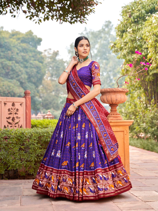 Presenting Patola Print With Foil Work Blue Color Lehenga Choli