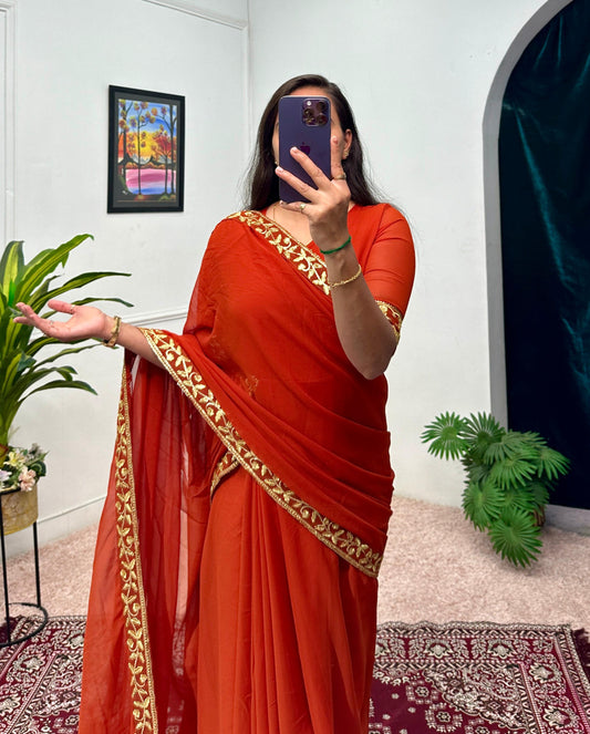 Captivating Embroidery Work Orange Color Saree Gown