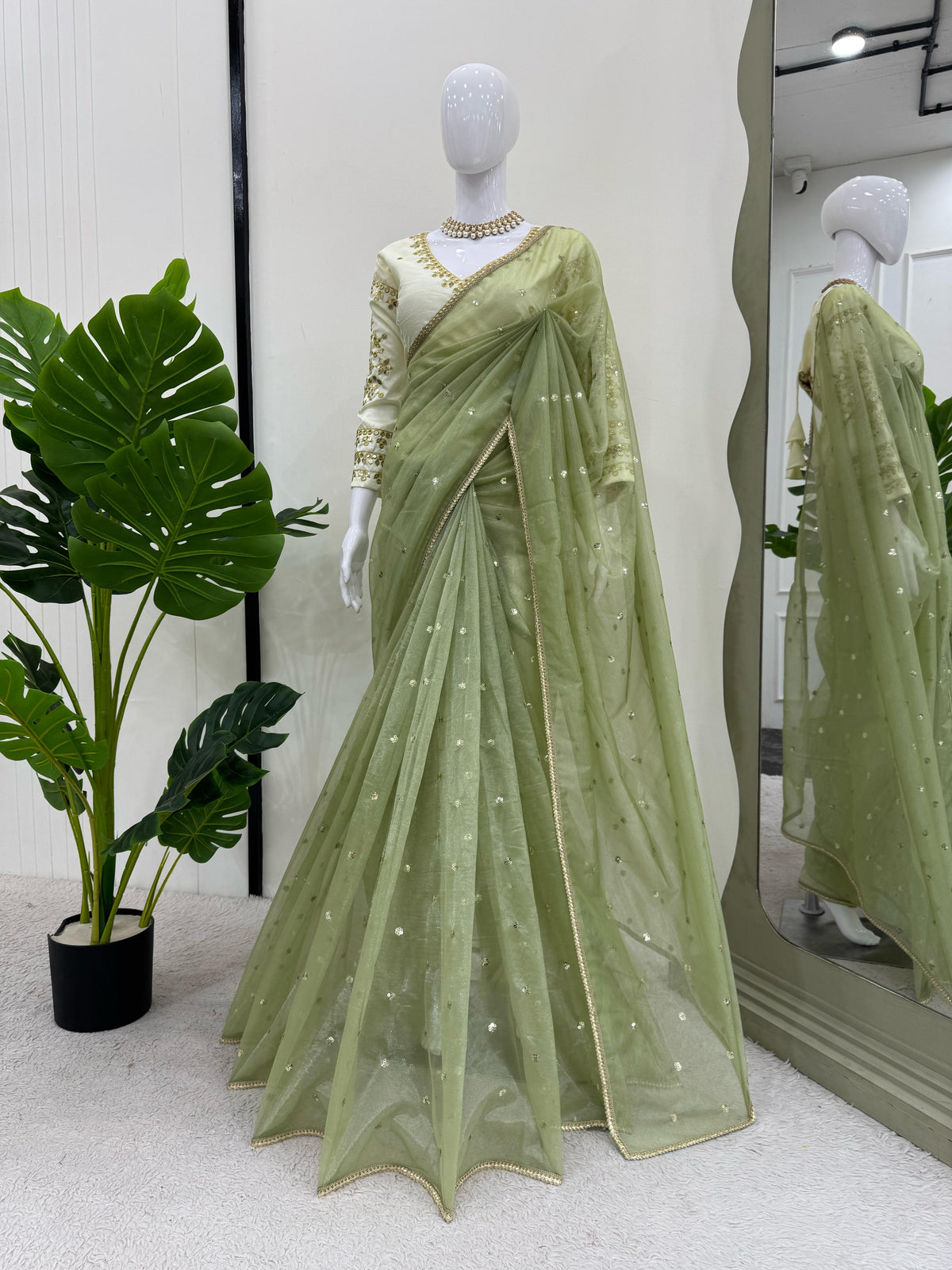 Outstanding Sequnce Work Net Mehndi Color Saree