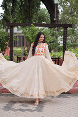 Ravishing White Cotton Embroidered Gown For Navratri