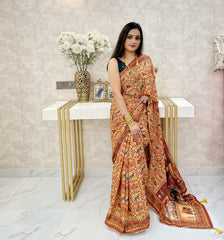 Patola Design Beige Color Saree With Handwork On Pallu