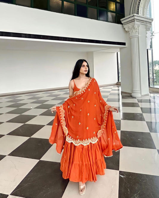 Party Wear Orange Color Ruffle Style Gown