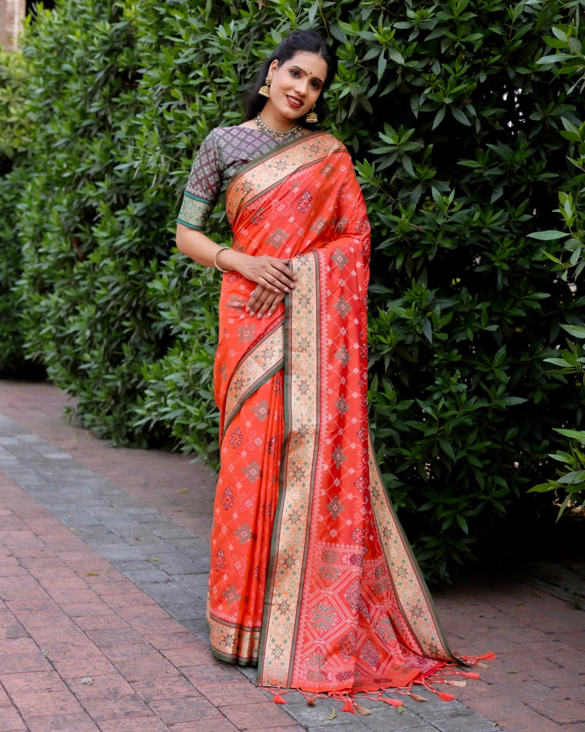 Dazzling Borders And Contrast Zari Weaving Patola Silk Sarees