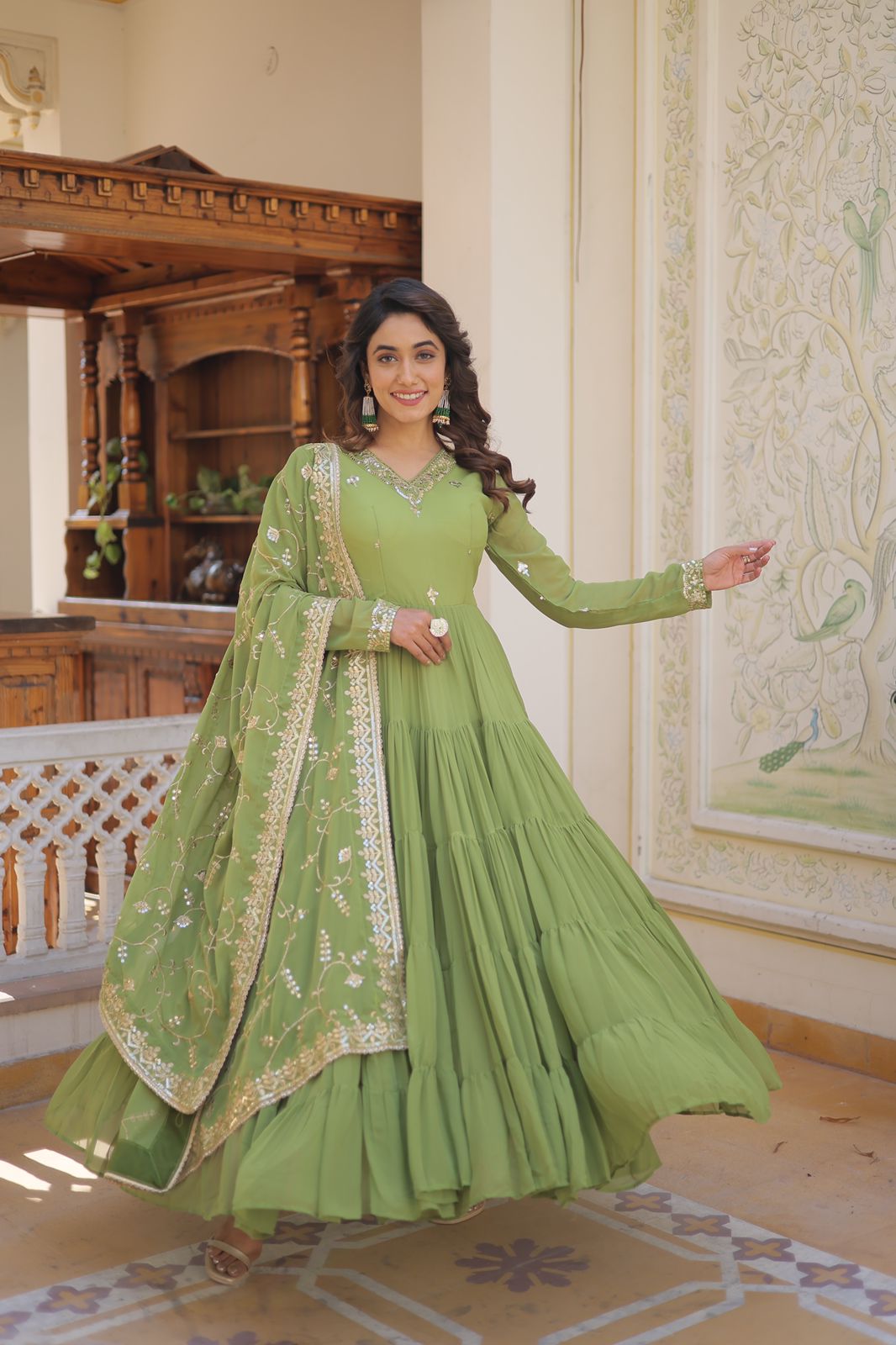 Luxuriant Ruffle Parrot Green Gown With Work Dupatta