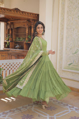 Luxuriant Ruffle Parrot Green Gown With Work Dupatta