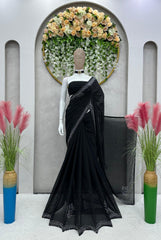 Outstanding  Black Color Georgette Hot Fix Work Saree