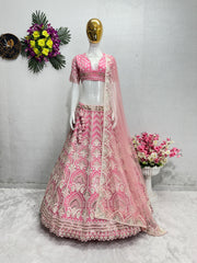 Presenting Embroidered Work With Peral Moti Work Peach Color Lehenga Choli