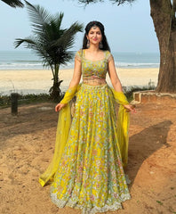 Embellished Embroidered Work With Real Mirror Work Perrot Color Lehenga Choli